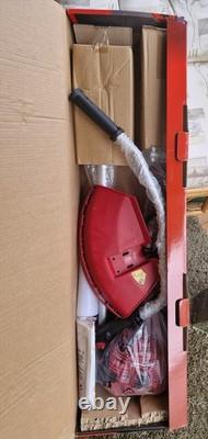 Einhell 2 stroke petrol strimmer with 2 stroke kit, strimmer line & metal blade