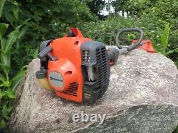 Husqvarna 122 LD Brush Cutter Strimmer with Chainsaw pruning attachment