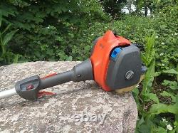 Husqvarna 122 LD Brush Cutter Strimmer with Chainsaw pruning attachment