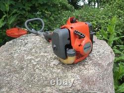 Husqvarna 122 LD Brush Cutter Strimmer with Chainsaw pruning attachment