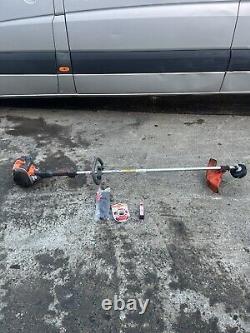 Husqvarna 525RJX brushcutter stihl oil, harness Approx Year 2018