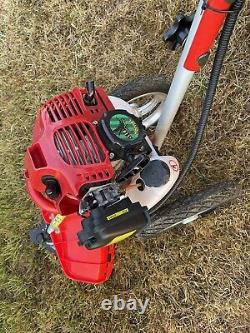 Petrol Powered Wheeled Strimmer