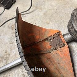 Accessoire de coupe-bordures Stihl FS KM avec tête de coupe multifonction.