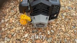 Coupe-brosse Titan Kombi avec débroussailleuse et tronçonneuse sur perche + extension