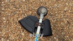 Coupe-brosse Titan Kombi avec débroussailleuse et tronçonneuse sur perche + extension