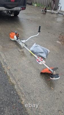 Débroussailleuse Stihl FS 410 CEM avec harnais de coupe à fil