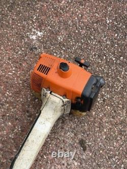Débroussailleuse thermique STIHL FS400 2 temps, poignée à deux mains, bandoulière d’épaule
