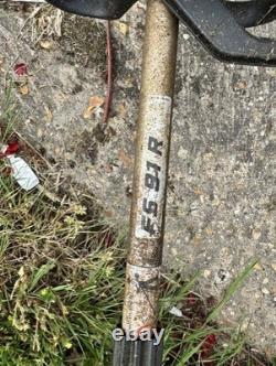 Débroussailleuse thermique Stihl FS 91R d'occasion, en état de marche