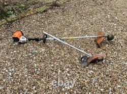 Stihl Km131r avec accessoires de débroussailleuse et de bordure de gazon